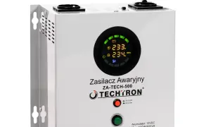 Biały zasilacz awaryjny TECHTRON ZA-TECH-500 z okrągłym wyświetlaczem pokazującym napięcie 233V i 234V. Jaki UPS, gdyby nagle zabrakło prądu!